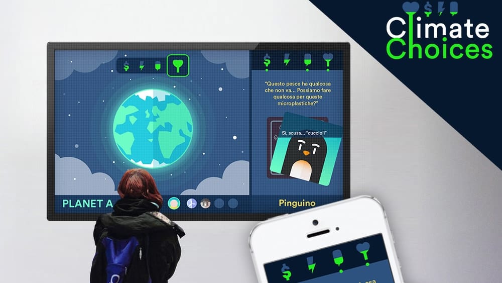 A visitor playing Climate Choices on a shared screen, with the same session mirrored on a phone